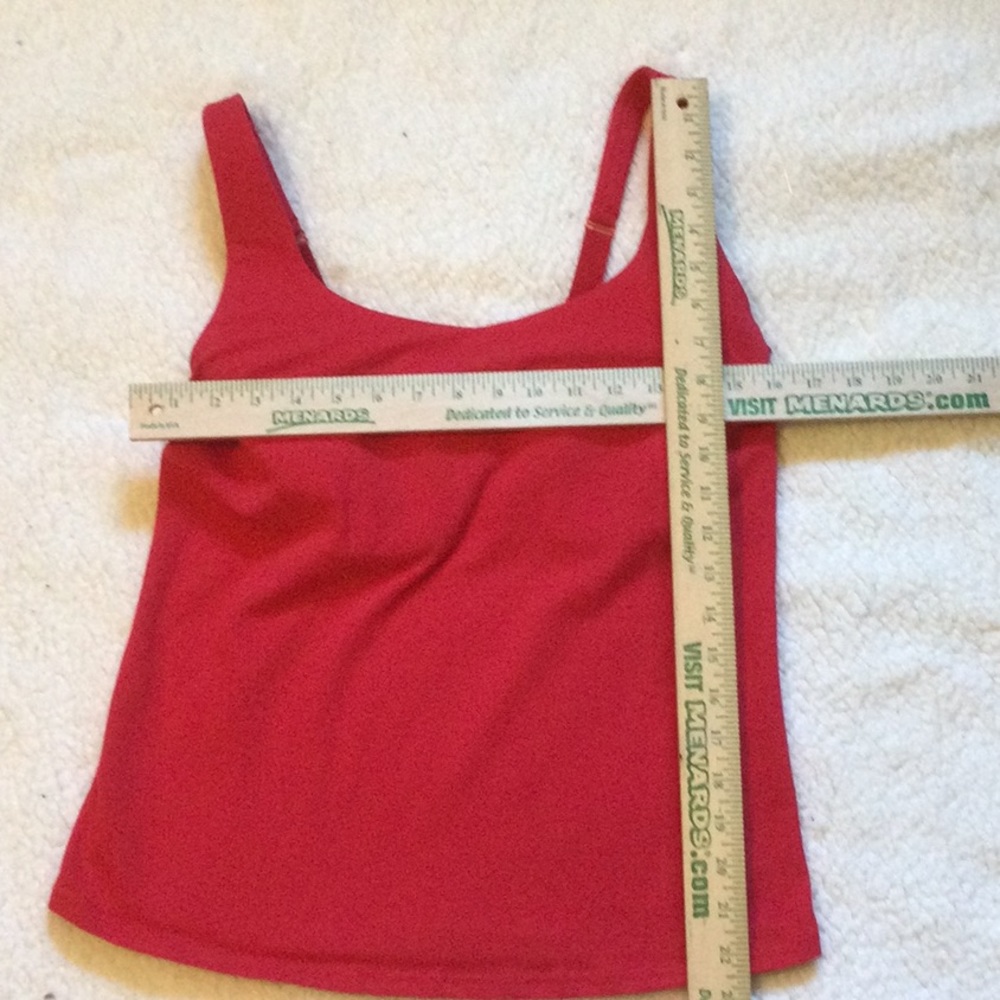 Red padded bra top new w/o tags. 95% cotton & 5% spandex in excellent condition